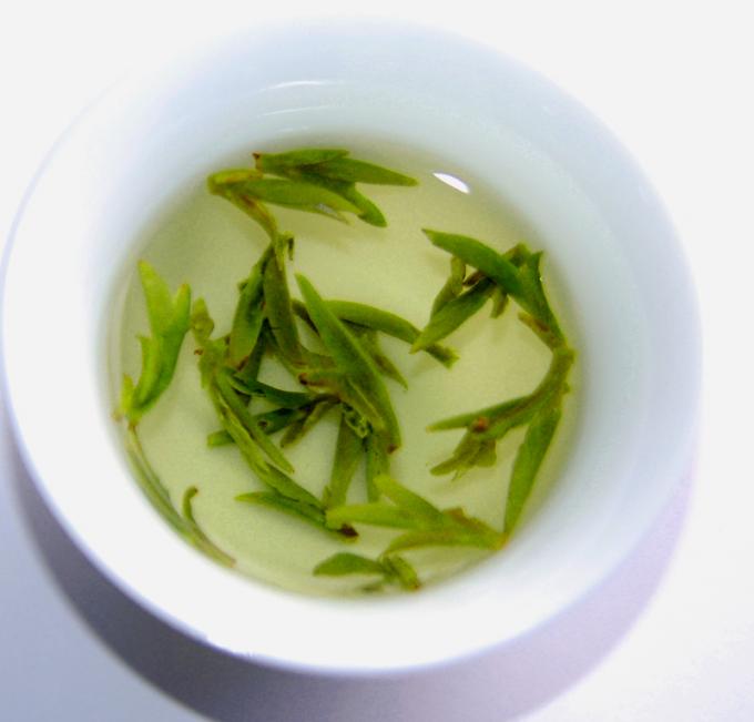 Hoja de té fresca del dragón de la salud del pozo del té verde de la forma orgánica de la forma curvada