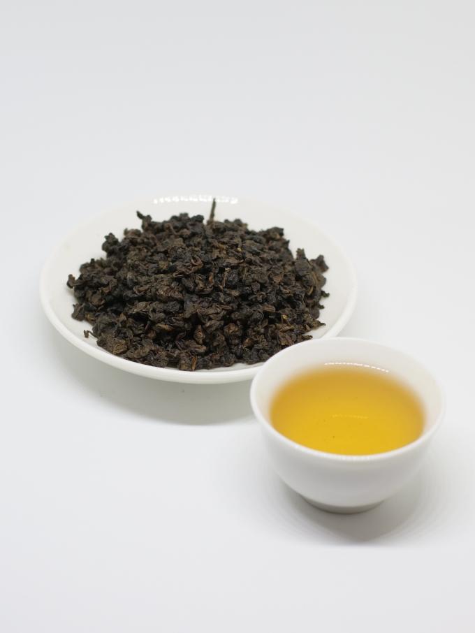 Lazo orgánico Guan Yin del té de Oolong de la primavera con las hojas de té verdes aplanadas