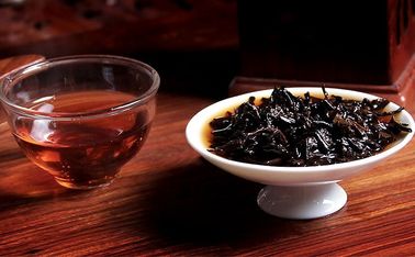 China Ladrillo maduro del té de Puerh del aroma liso, antienvejecedor y el calmar de Puerh del té proveedor